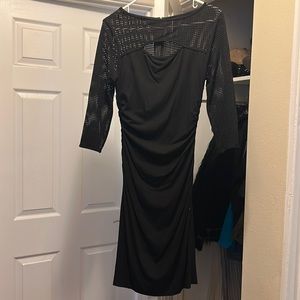 Cache black dress with fishnet like sleeves